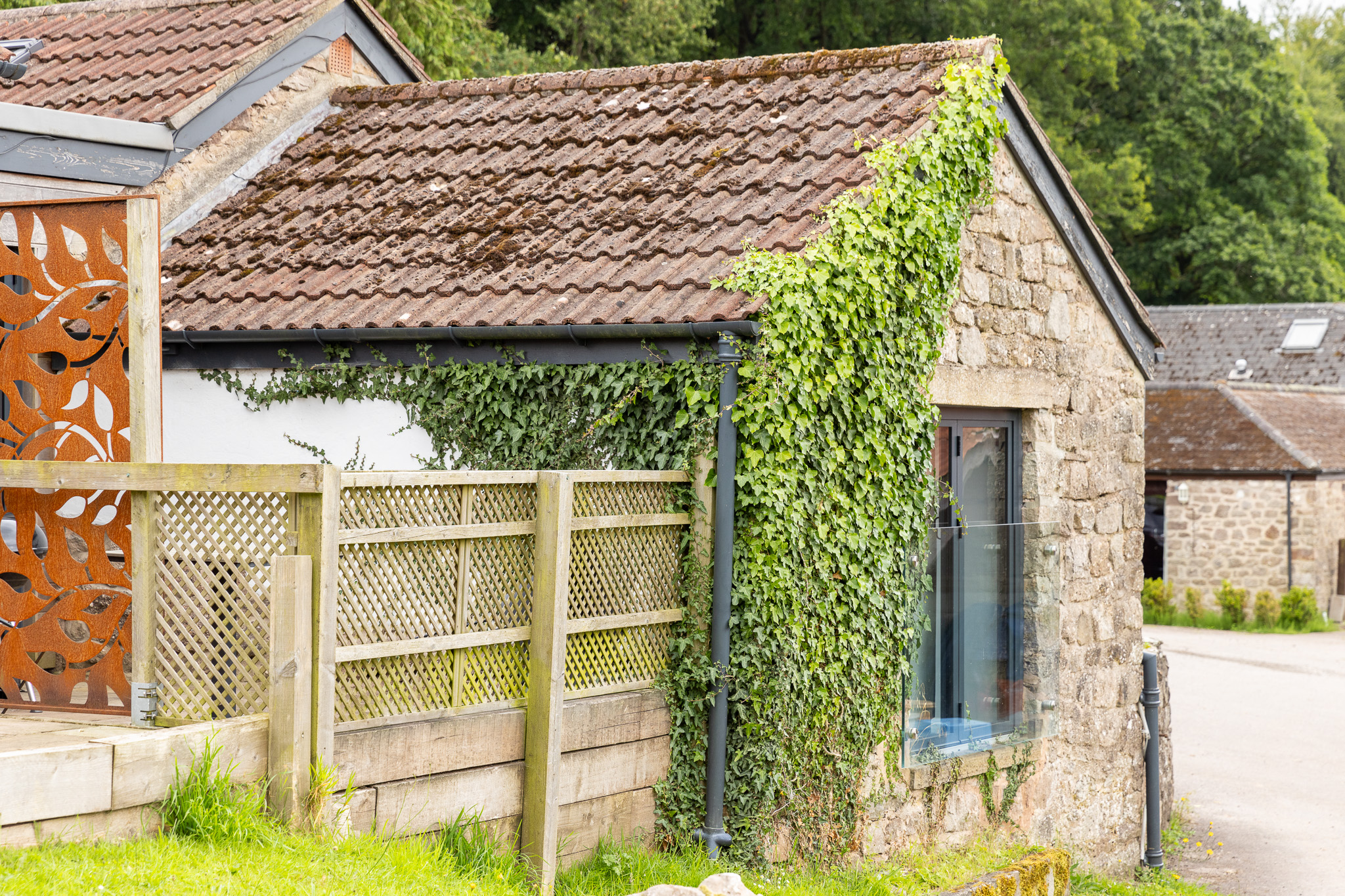 The rustic ivy-covered exterior of the Blorenge cottage
